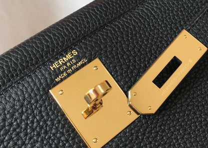 Femme Élégance Classic Top Handle Bag – Black Gold Edition